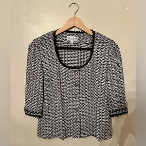 St John three quarter sleeve jacket with iridescent thread and dressy buttons.